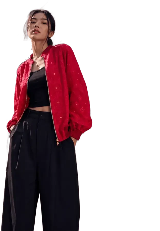Model in a red jacket and black trousers